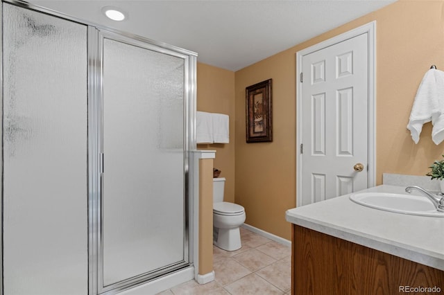 9249 Fox Fire Dr, Highlands Ranch, CO 80129 - bathroom featuring vanity, tile patterned flooring, and a shower stall