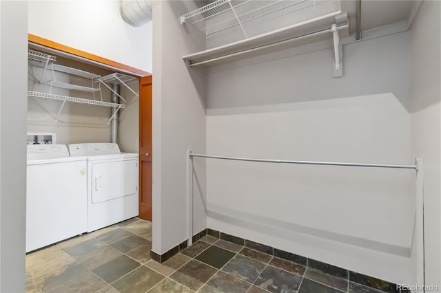 laundry room with washing machine and dryer