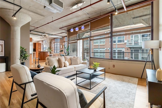 1863 Wazee St Unit 6E, Denver, CO 80202 - living room featuring wood finished floors