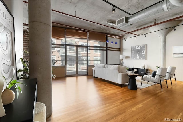 1863 Wazee St Unit 6E, Denver, CO 80202 - living area featuring wood finished floors