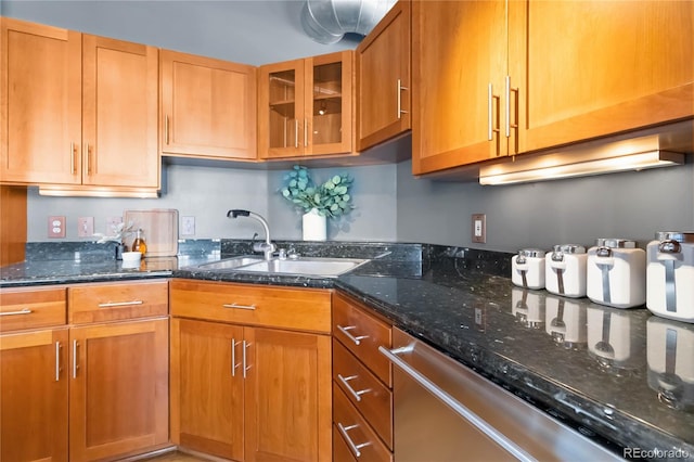 1863 Wazee St Unit 6E, Denver, CO 80202 - kitchen featuring stainless steel dishwasher, dark stone countertops, glass insert cabinets, and brown cabinets