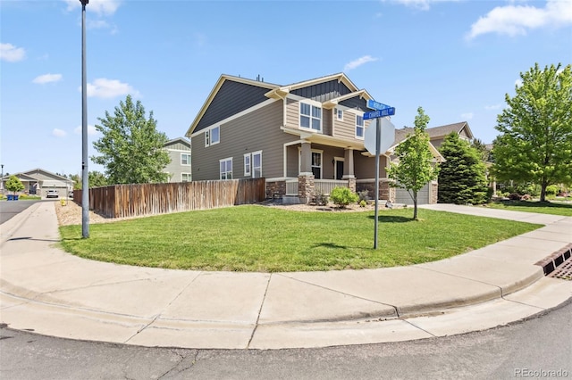 3823 Horiuchi St, Brighton, CO 80601 - craftsman inspired home featuring board and batten siding, driveway, stone siding, and covered porch