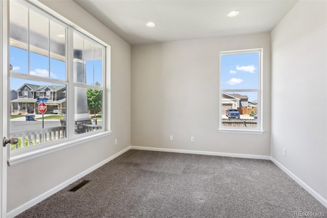 3823 Horiuchi St, Brighton, CO 80601 - carpeted empty room with baseboards and recessed lighting