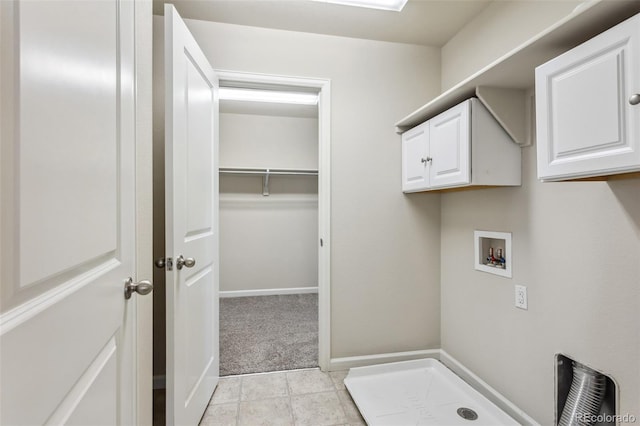 3823 Horiuchi St, Brighton, CO 80601 - washroom featuring hookup for a washing machine, cabinet space, light colored carpet, light tile patterned flooring, and baseboards