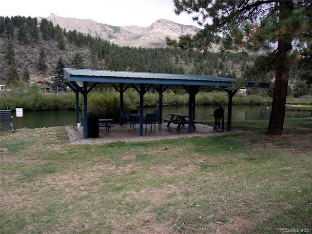 57920 US Highway 285 Unit 10, Bailey, CO 80421 - view of property's community with a gazebo, a lawn, and a water and mountain view