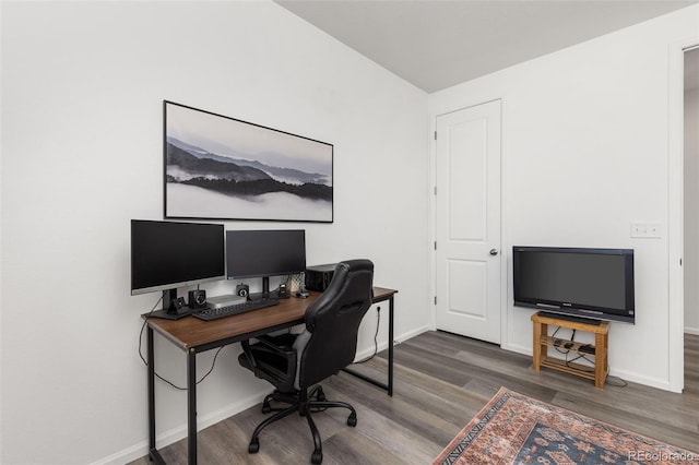 office featuring wood finished floors and baseboards