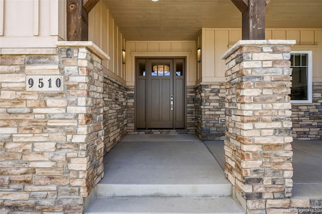 9510 Orion Way, Arvada, CO 80007 - property entrance featuring stone siding and board and batten siding