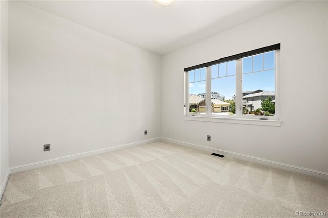 9510 Orion Way, Arvada, CO 80007 - spare room with baseboards and light carpet