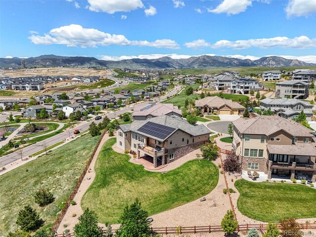 9510 Orion Way, Arvada, CO 80007 - aerial view of residential area featuring a mountainous background