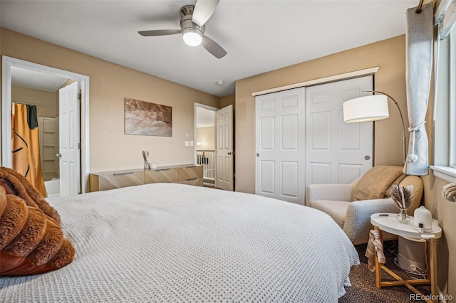 carpeted bedroom with ceiling fan and a closet