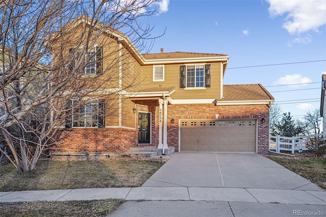 view of front of property with a garage