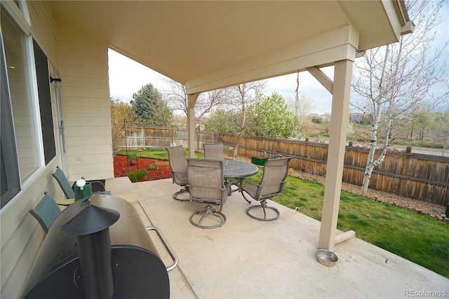 view of patio / terrace featuring a fenced backyard and outdoor dining space
