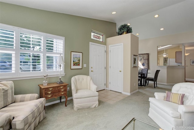 living area with recessed lighting, baseboards, vaulted ceiling, and light colored carpet