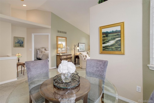 dining space with light carpet, baseboards, visible vents, vaulted ceiling, and recessed lighting