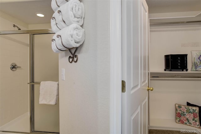 full bath featuring a shower stall and recessed lighting