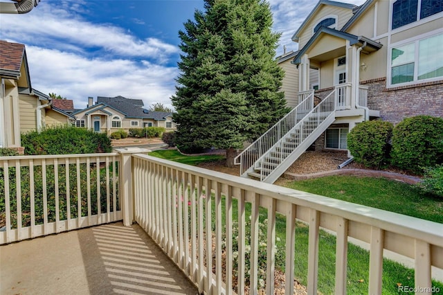 balcony featuring a residential view