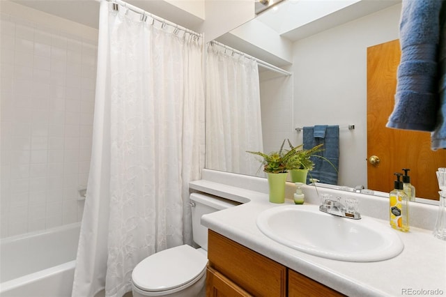 full bathroom with vanity, shower / tub combo, and toilet