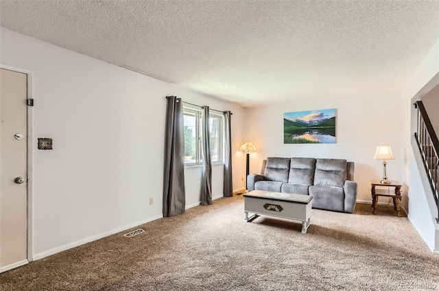 8613 Santa Fe Dr, Thornton, CO 80260 - carpeted living room with a textured ceiling and baseboards