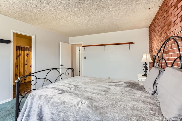 8613 Santa Fe Dr, Thornton, CO 80260 - bedroom featuring a closet, carpet floors, and a textured ceiling