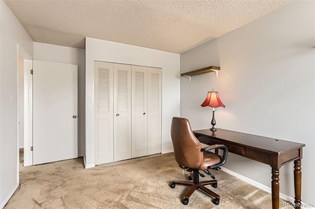 8613 Santa Fe Dr, Thornton, CO 80260 - carpeted home office featuring a textured ceiling and baseboards