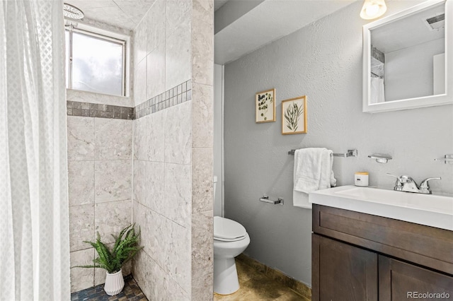 5920 Garrison St, Arvada, CO 80004 - bathroom with toilet, vanity, and a shower with curtain