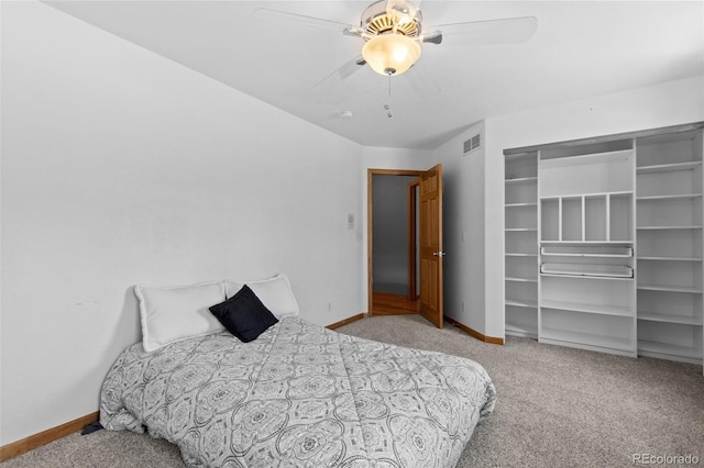 bedroom featuring light colored carpet, visible vents, ceiling fan, and baseboards