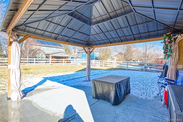 view of patio / terrace with a fenced backyard and a gazebo