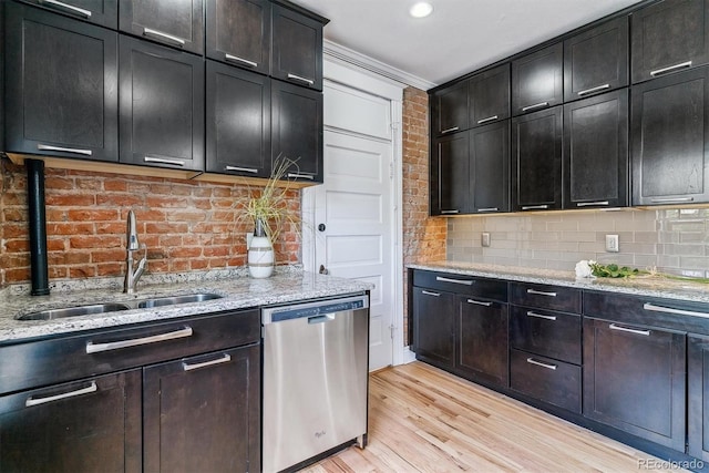 2566 N Emerson St, Denver, CO 80205 - kitchen featuring stainless steel dishwasher, a sink, light wood finished floors, tasteful backsplash, and light stone countertops