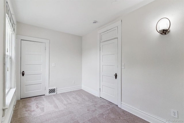 2566 N Emerson St, Denver, CO 80205 - unfurnished room with carpet and baseboards