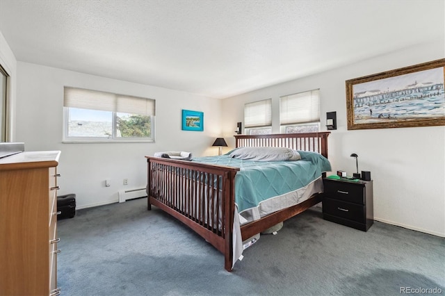 carpeted bedroom featuring a baseboard radiator and baseboards