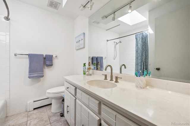 full bath featuring a baseboard heating unit, toilet, vanity, and rail lighting