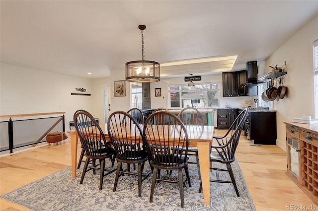 dining area featuring light wood-type flooring