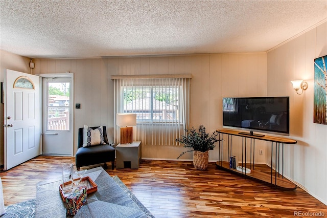 753 S Utica St, Denver, CO 80219 - living room with a textured ceiling and wood finished floors