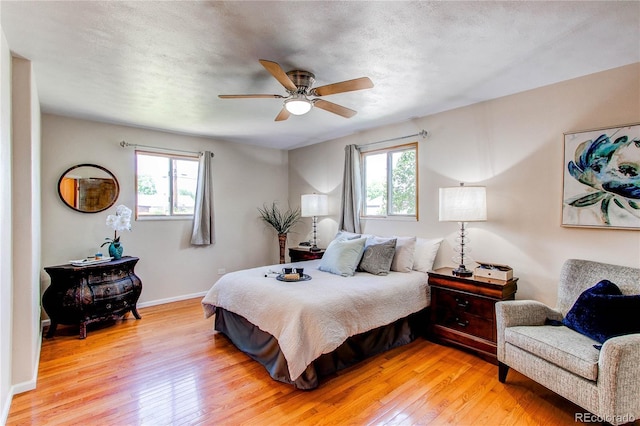 753 S Utica St, Denver, CO 80219 - bedroom featuring light wood-type flooring, baseboards, and ceiling fan