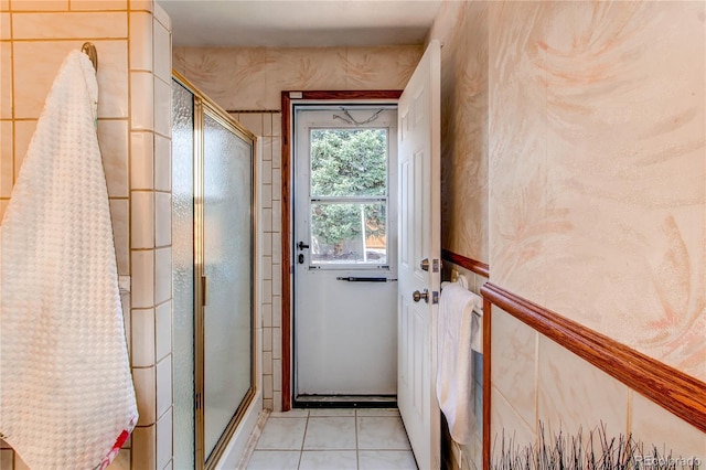 753 S Utica St, Denver, CO 80219 - doorway to outside featuring light tile patterned floors