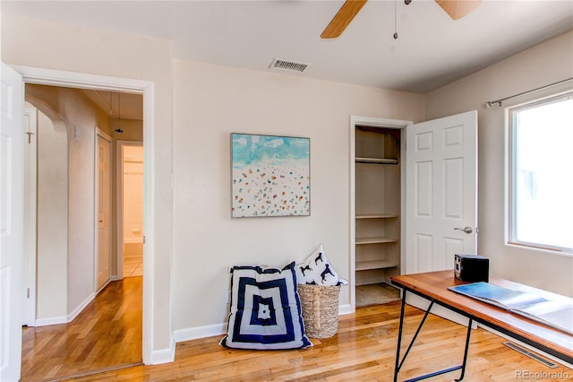 753 S Utica St, Denver, CO 80219 - office area featuring light wood-style flooring, a ceiling fan, and baseboards
