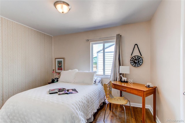 753 S Utica St, Denver, CO 80219 - bedroom with wood finished floors and baseboards
