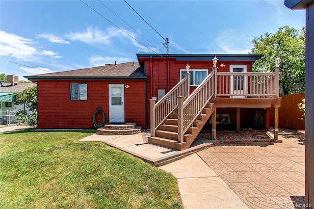 753 S Utica St, Denver, CO 80219 - back of property with a deck and stairs