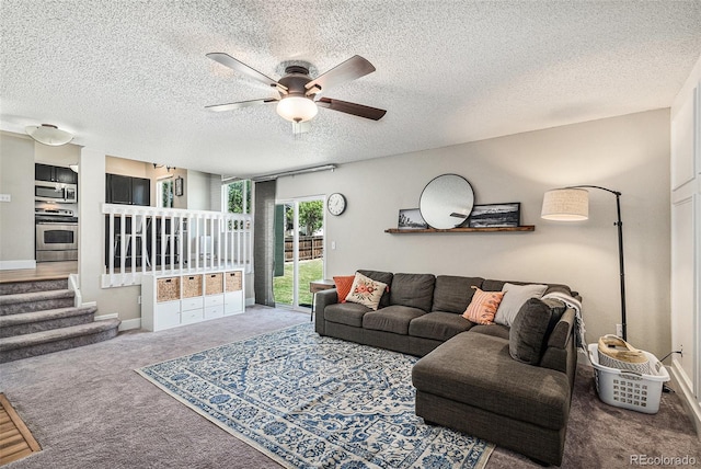5102 S Lisbon Way, Centennial, CO 80015 - living room featuring carpet floors, a ceiling fan, a textured ceiling, and stairway