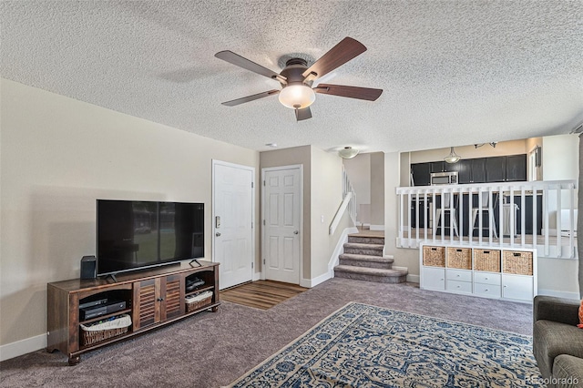 5102 S Lisbon Way, Centennial, CO 80015 - carpeted living room featuring ceiling fan, stairs, and a textured ceiling
