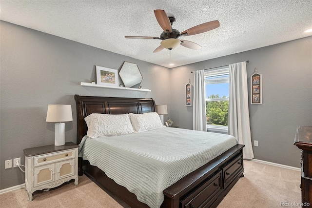5102 S Lisbon Way, Centennial, CO 80015 - bedroom with light carpet, a textured ceiling, and ceiling fan