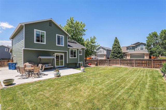5102 S Lisbon Way, Centennial, CO 80015 - rear view of property with a fenced backyard and a patio