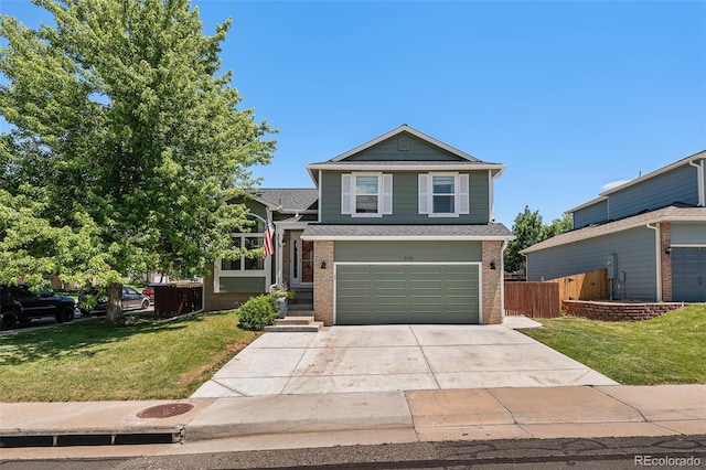 5102 S Lisbon Way, Centennial, CO 80015 - view of front of home featuring brick siding, an attached garage, and driveway