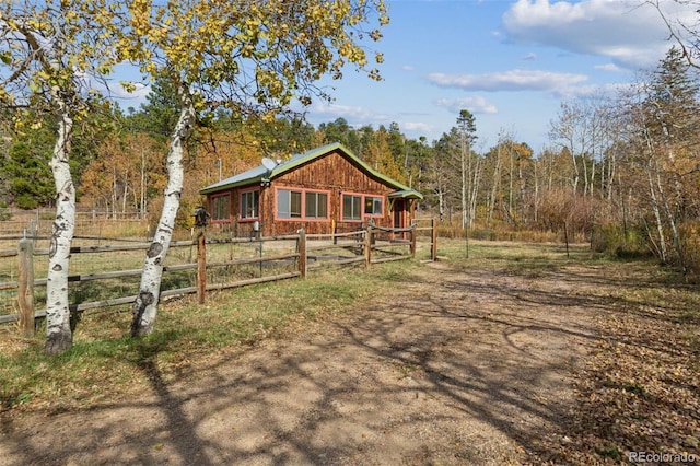 24427 Peak To Peak Hwy, Nederland, CO 80466 - view of yard with fence and a forest view
