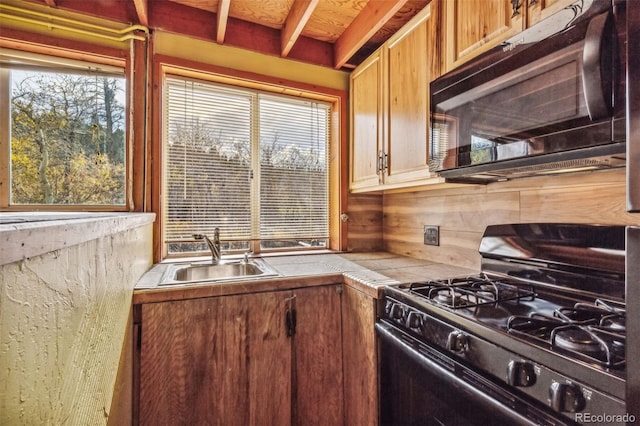 24427 Peak To Peak Hwy, Nederland, CO 80466 - kitchen with black appliances, a sink, and tile countertops
