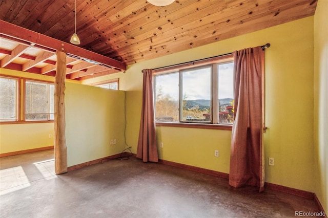 24427 Peak To Peak Hwy, Nederland, CO 80466 - unfurnished bedroom featuring concrete flooring, baseboards, a mountain view, and wood ceiling