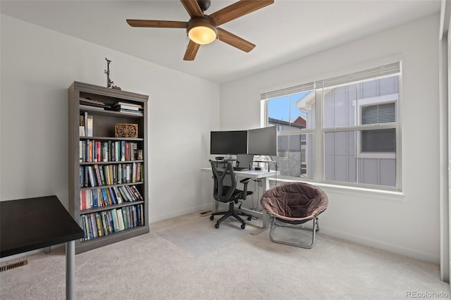 8372 Bijou Creek Ave, Littleton, CO 80125 - home office with carpet floors, ceiling fan, and baseboards