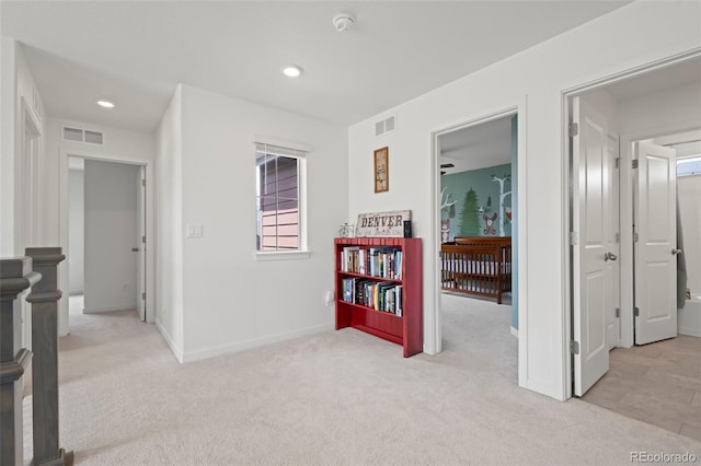 8372 Bijou Creek Ave, Littleton, CO 80125 - hallway with light carpet, baseboards, and recessed lighting