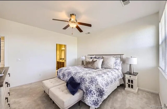 8915 Federal Blvd Unit 203, Westminster, CO 80260 - bedroom with light carpet, ceiling fan, and ensuite bath