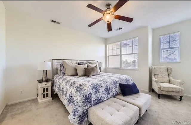 8915 Federal Blvd Unit 203, Westminster, CO 80260 - bedroom featuring light carpet, baseboards, and a ceiling fan